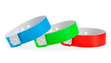 Regular vinyl wristbands in 14 vibrant colors with snap closure for events and venues